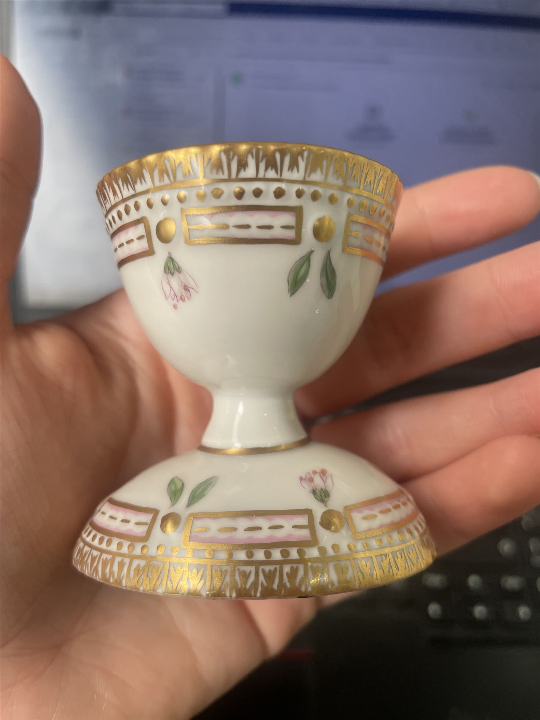 Royal Copenhagen Flora Danica wares, comprising covered mustard pot with naturalistically modelled vine handles and decorated with Cushion Pink (Cucubalius Acaulis) H8cm, milk jug decorated with Maiden Pink (Dianthus Deltoides) H7cm, covered dish decorated with Dwarf Milkwort (Polygala Amarum) W8cm, oval salt cellar decorated with Alpine Squill (Scilla Bifolia) W11cm, egg cup, pin dish and cased hand mirror, various Latin specimen inscriptions to base, all with printed and painted marks beneath (7)