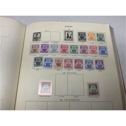 Single album collection of King George VI stamps, including Aden, Antigua, Ascension, Australia, Bahamas, Bahrain, Barbados, Basutoland, Bechuanaland, Bermuda, British Solomon Islands, Brunei, Burma, Cayman Islands, Dominica, Falkland Islands, Gambia, Gilbert and Ellice Islands, Gold Coast, Great Britain 1939-48 set to one pound including ten shilling dark blue, Grenada, Hong Kong, India, Ireland, Jamaica, Leeward Islands, Malta, Mauritius, New Zealand etc