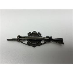 Popski's Private Army sterling silver cap badge; and two silver sweetheart brooches for Highland Light Infantry as a rifle and silver gilt Glengarry badge and Army Service Corps with blue enamel; and another silver badge (4)