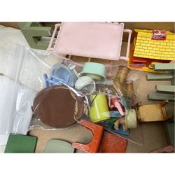 Quantity of various scale 1930s doll's house furniture including wooden grand piano, tables and chairs etc; plastic accessories including Fairy Lite sewing machine, trays, table wares, buckets, high chair etc; metal items including tin-plate doll's pram, terrestrial globe, die-cast typewriter and telephone, companion set and coal scuttle etc