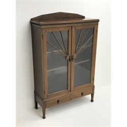 Early 20th century walnut display cabinet, sun burst astragal glazed doors with mottled glass, two adjustable shelves, two drawers to base, W91cm, H143cm, D33cm