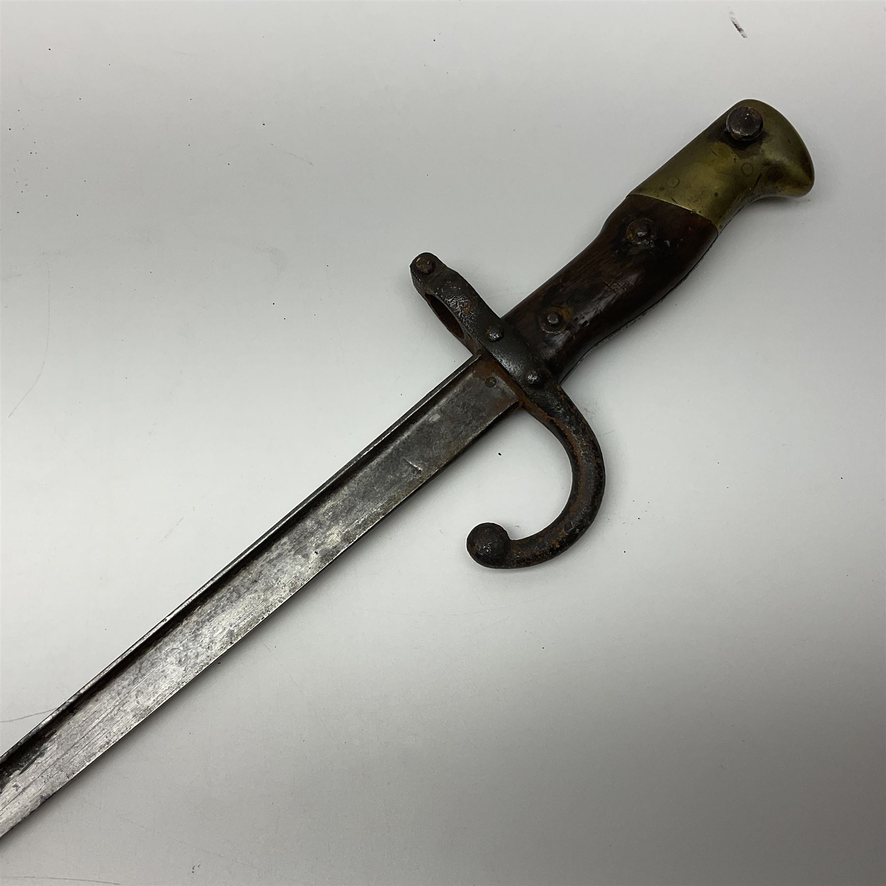 Two 19th century French model 1874 epee bayonets, each with 52cm steel blade, and armoury dates for 1880 and 1881 L64cm overall (2)