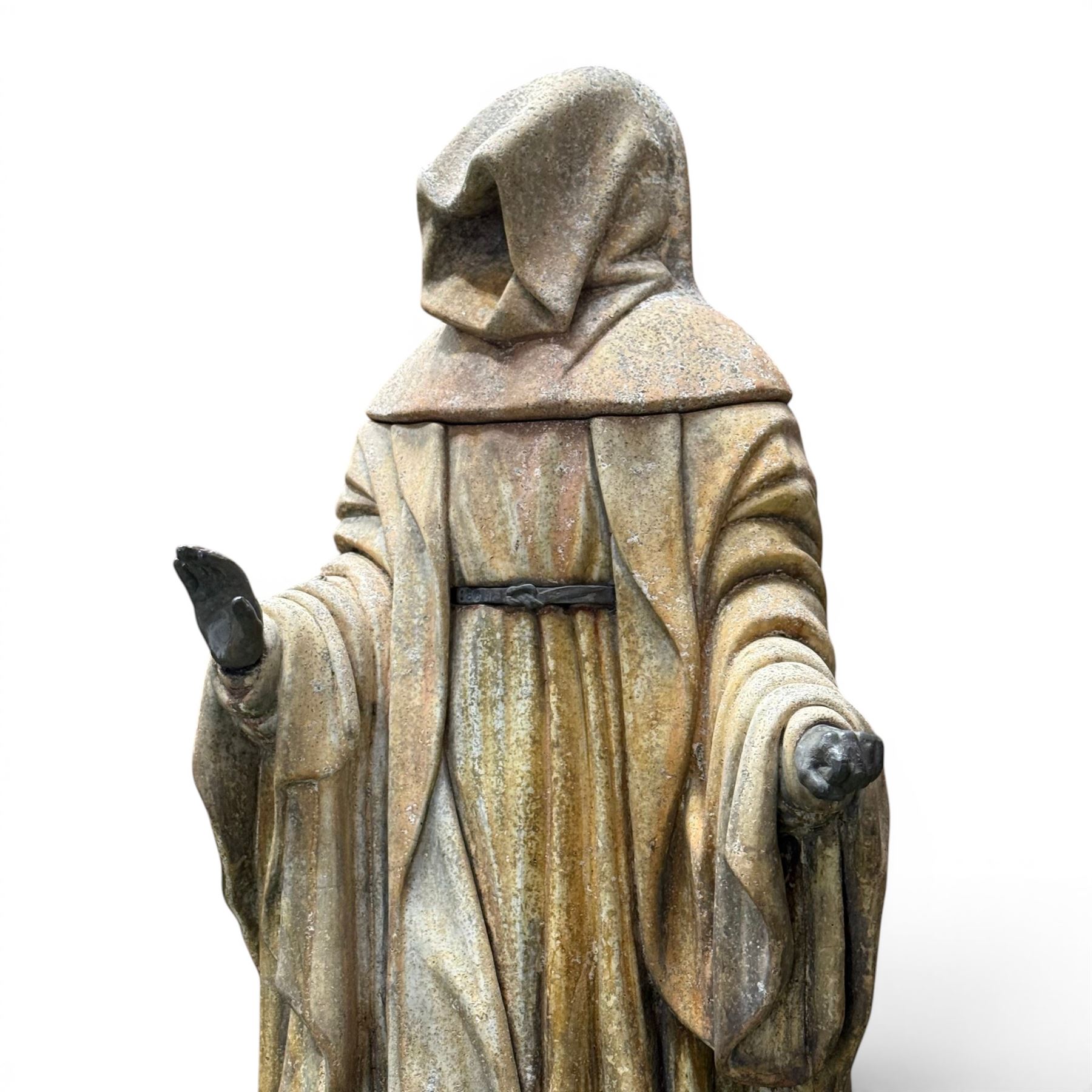 Farran stone garden statue depicting a hooded monk standing in flowing robes in circular form, set upon Gothic pedestal with arched panels, featuring lead hands and script band