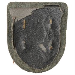 German Third Reich Krim shield arm badge 1941-1942, Auxiliary Cruiser badge and a WWI first class Iron Cross with field conversion (3) 