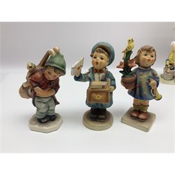 Twenty six Hummel figures by Goebel, to include What a Smile, Horse Trainer and Hear Ye, Hear Ye