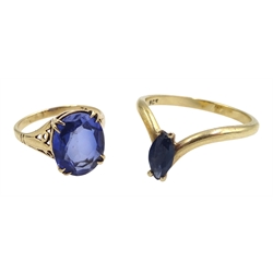  Gold marquise shaped sapphire wishbone ring and a gold synthetic oval sapphire ring, both stamped 9ct 