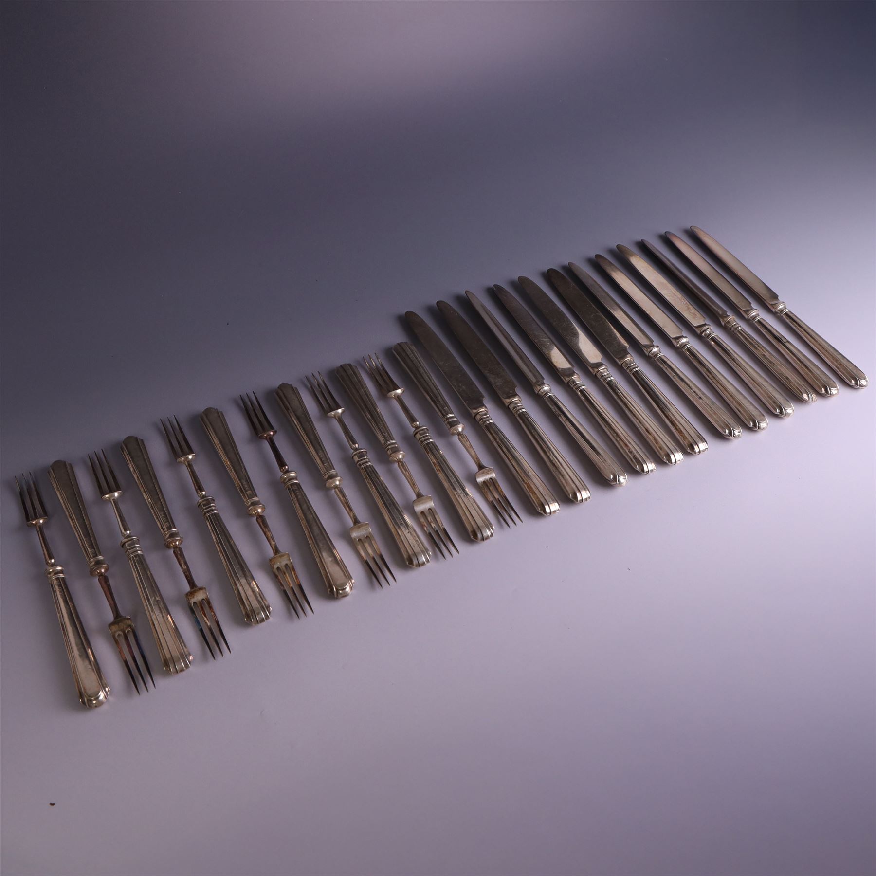 Set of twelve 1920s silver handled dessert knives and forks, hallmarked Thomas Bradbury & Sons Ltd, Sheffield 1921