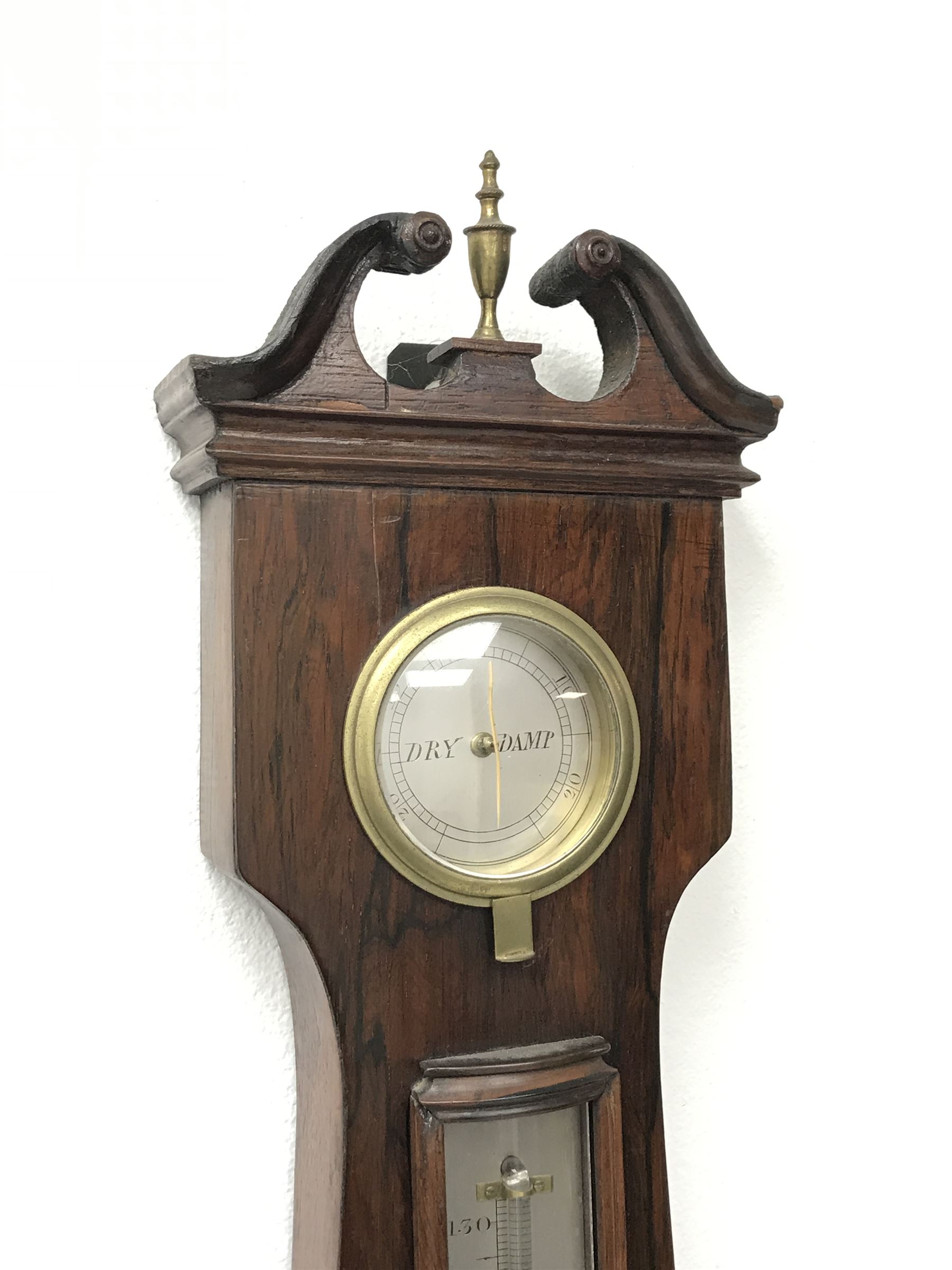 Early 19th century rosewood four dial banjo barometer, dry/damp dial, mercury thermometer, silvered circular register engraved with urn and scroll decoration, balance signed 'Vassalli Scarborough', fitted with mother of pearl adjusting handle