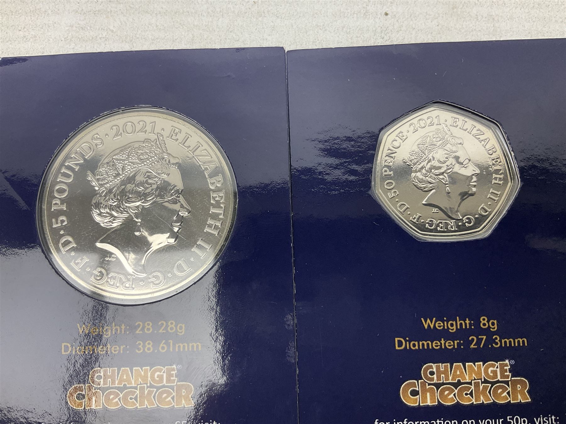 Coins and sets, including Great Britain and Northern Ireland 1970 proof coin collection in card folder, Queen Elizabeth II 2021 'Through the Looking Glass' five pounds, 2021 'Winnie the Pooh' fifty pence, Queen Victoria 1887 halfcrown, King George V 1914 halfcrown, commemorative coins, The Royal Mint Solomon Islands 2003 twenty-five dollars silver proof coin cased with certificate, 9ct gold half sovereign mount etc