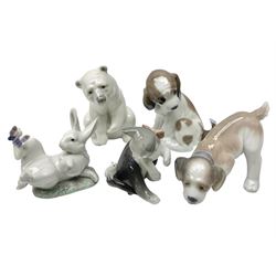 Five Lladro figures, comprising Cat and Mouse no. 5236, That Tickles no. 5888, Gentle Surprise no. 6210, Little Hunter no. 6212 and Resting Polar Bear no. 1208, largest H12cm