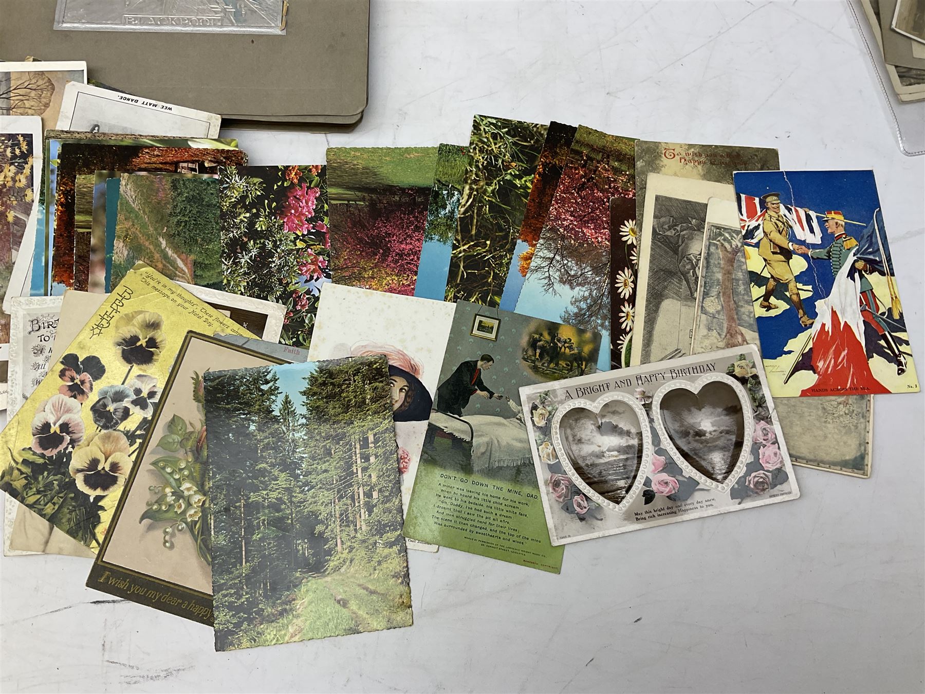 Quantity of ephemera to include Victorian and later postcards and greeting cards, photograph albums, autograph books including illustrations, crew list from Henrietta (Whitby ship), old lime quarry bill, etc