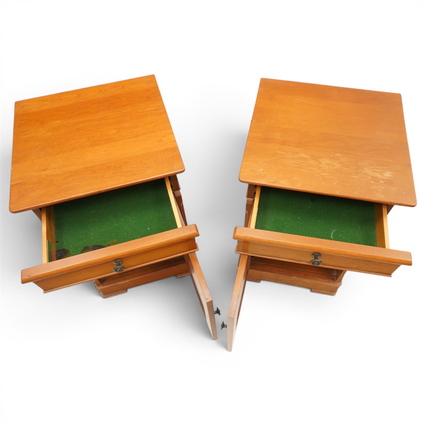 St Michael - pair of cherrywood bedside tables, single drawer above a fielded panel door, brass pulls, raised on a plinth base