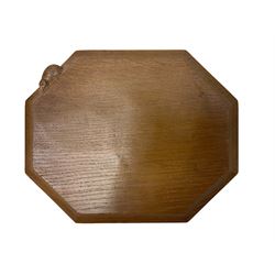 Mouseman - adzed oak breadboard, canted rectangular form with moulded edge carved with mouse signature, by the workshop of Robert Thompson, Kilburn, W31cm D25cm