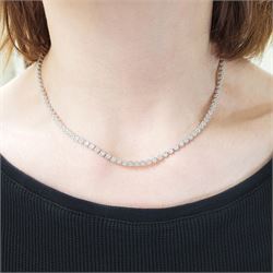 18ct gold diamond necklace, one hundred fourteen clusters, each set with seven round brilliant cut diamonds, hallmarked, total diamond weight 5.00 carat, boxed with certificate