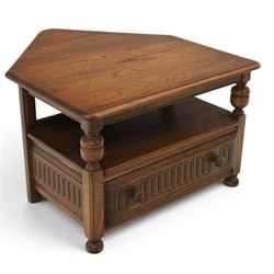 Ercol -  dark elm corner TV stand and coffee table, TV stand with drop triangular leaf, over open recess above a single drawer (H 47cm, D 44cm with leaf 79cm, W 73cm,  the coffee table with chamfered rectangular top with full length undertier, raised on turned supports (H 43cm, D 54cm, W 115cm) 
