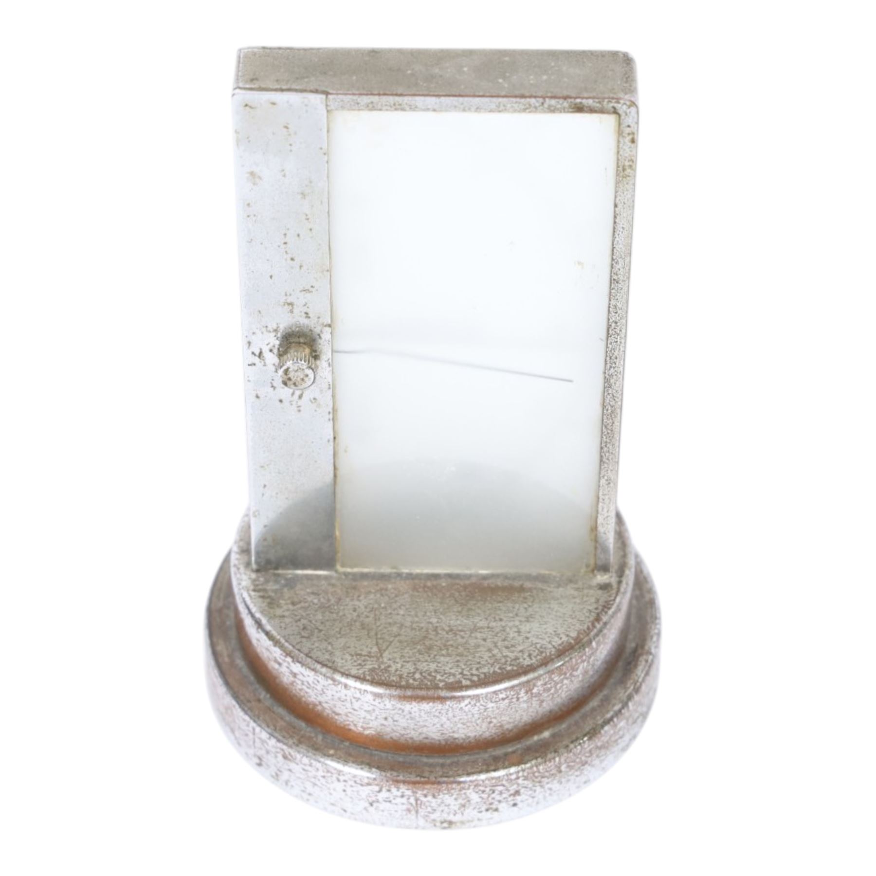 Art Deco chrome plated desk aneroid barometer by Zeiss Ikon, with frosted glass panel to rear, upon raised on a stepped circular base with instructions printed on the underside, H16cm