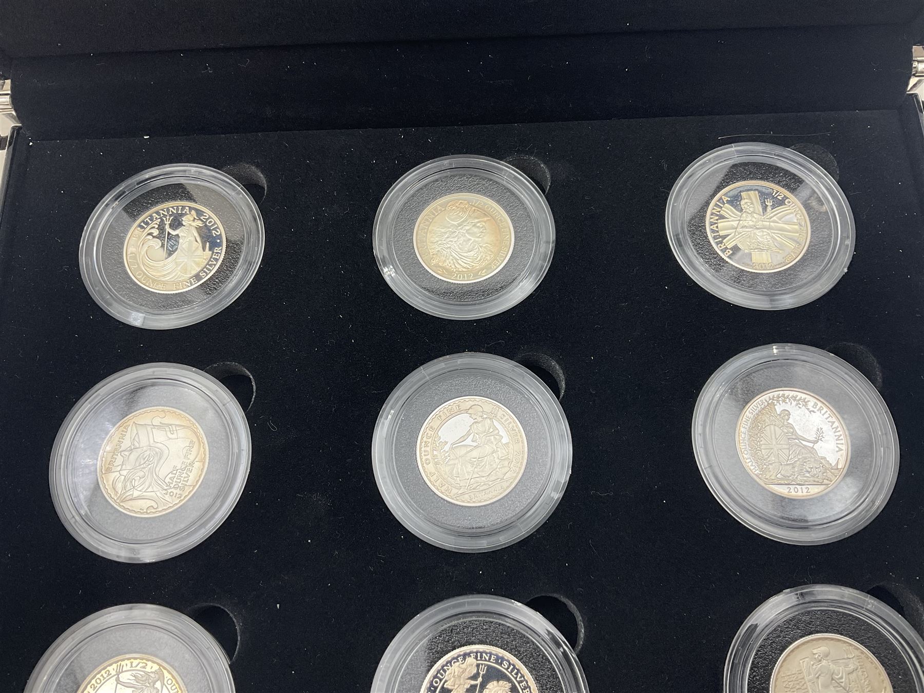 The Royal Mint United Kingdom 2012 'Britannia 25th Anniversary 1987-2012 The Silver Portrait Collection First Strikes' comprising nine half ounce fine silver Britannia coins, cased with certificate