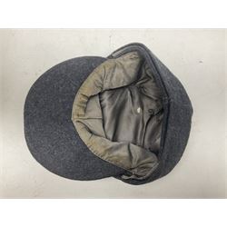 WW2 German Luftwaffe M43 field cap with triangular cloth eagle and roundel badge; marked '1944 ?/0501/0015 57'