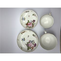 Oversized early 19th century Derby breakfast cup and saucer, circa 1806-1825, together with a further smaller example, each with osier moulded band to the rim and hand painted with floral sprays and sprigs, each with painted mark beneath, large cup D11, large saucer D16.5cm, smaller cup D9cm, smaller saucer D14cm