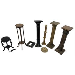 Ebonised pedestal stand with scroll carved decoration and fluted body (H114cm); pedestal stand with fluted body (H108cm); stained beech pedestal stand with small cupboard; spiral turned two-tier stand; fluted beech plant stand; and a small ebonised stand (6)