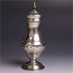 Early 20th century silver sugar caster, of typical form with removable pierced cover and upon circular foot, hallmarked Charles Edwards, London 1916, H18cm