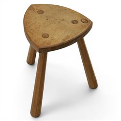 Acornman - oak milking stool, with signature acorn carving by the workshop of Alan Grainger of Brandsby