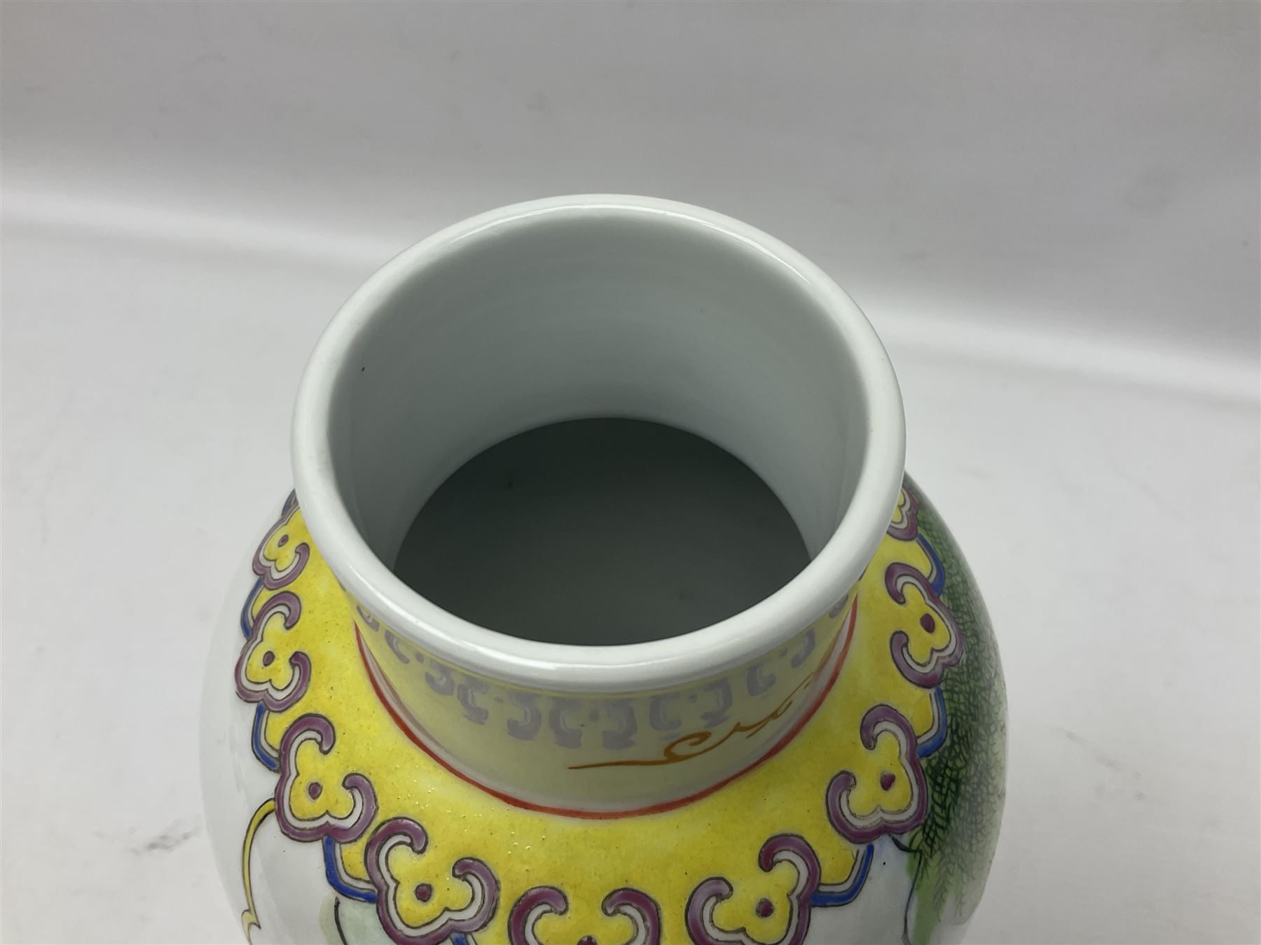 Chinese Famille Rose vase of slender baluster form, decorated with figures, H31cm  