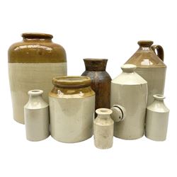 Large Doulton Lambeth stoneware jar together with other stoneware flagon, jar and bottles, and wood flagon