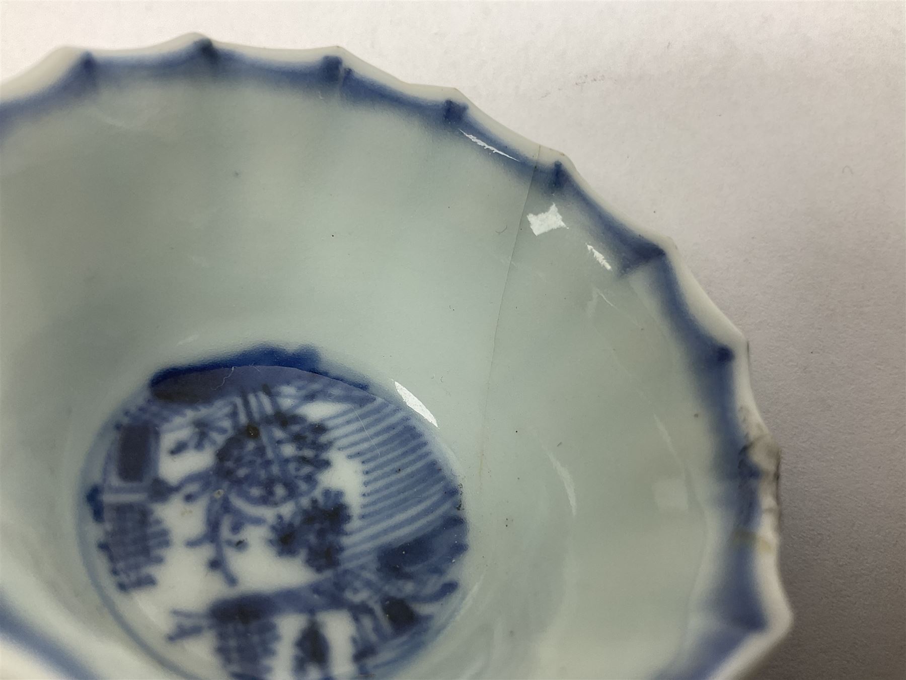 Chinese Kangxi blue and white fluted tea bowl and saucer 
