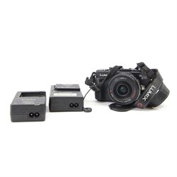 Panasonic Lumix DMC-GX1 digital camera serial no. FT2DA801057 with a Lumix G Vario 1:3.5 -...