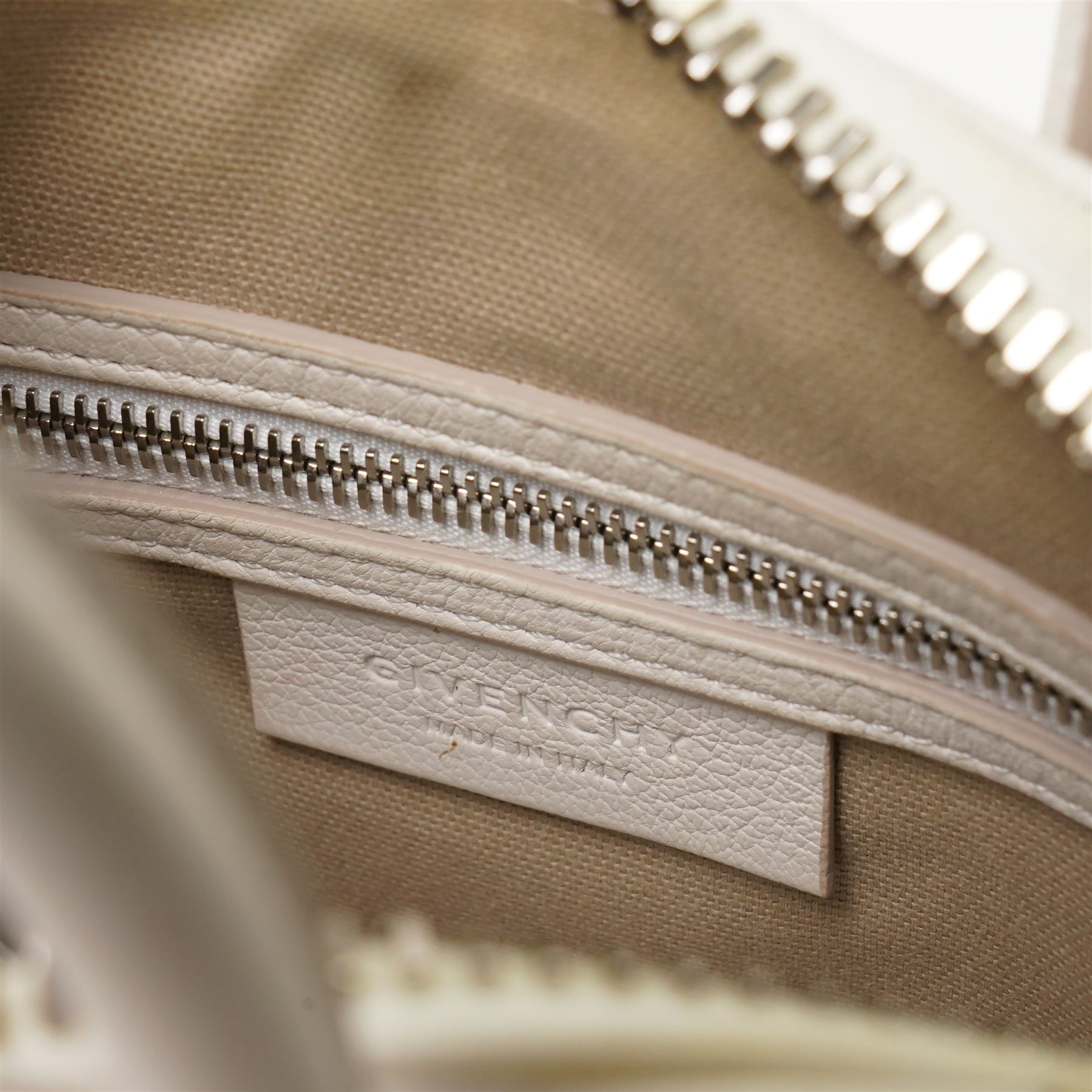 Givenchy - ‘Antigona’ Mini Bag, introduced circa 2011 under Riccardo Tisci, in structured white grained goat leather, with twin top carrying handles and detachable wide adjustable crossbody strap, with silver tone hardware, with original dust bag