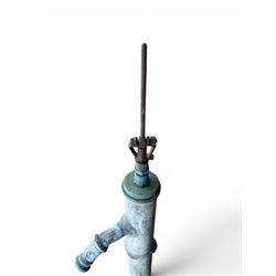 Georgian period lead garden water pump, with iron handle, set in square stone base