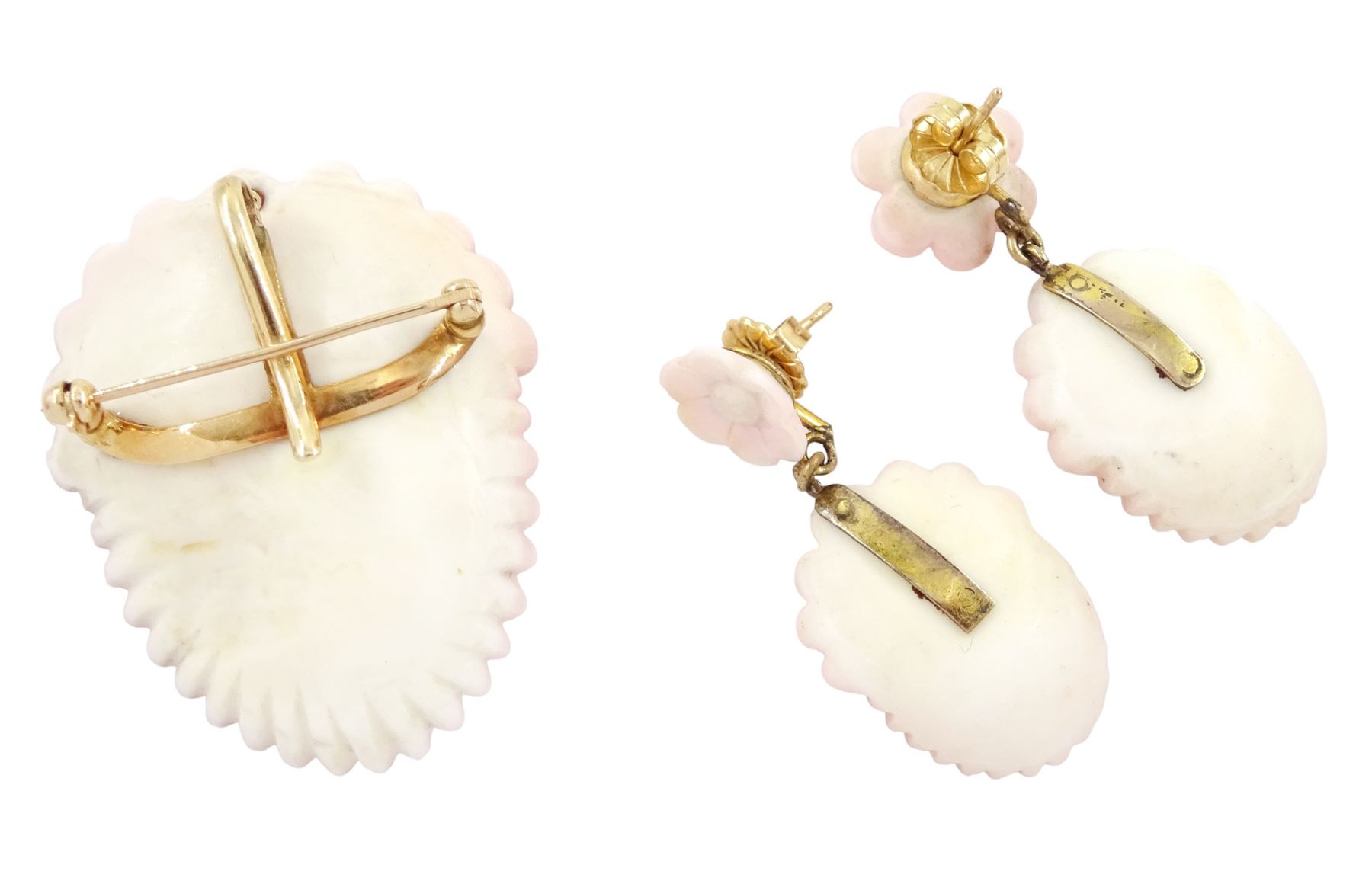 19th century gold conch shell pendant / brooch and matching earrings, each with carved bust shell of a cherub / child and flower head decoration, the earrings suspending a further flower head stud