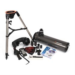 Celestron Nexstar 130SLT stargazing telescope, on a tripod stand, with lenses and other accessories