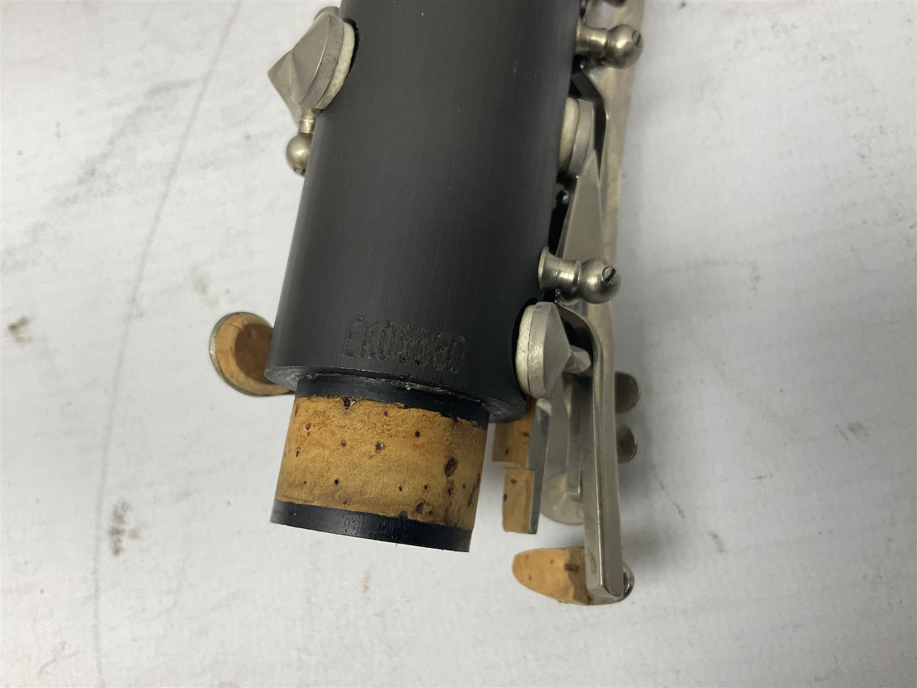 Windsor five-piece clarinet, serial no.EK05580; and Selmer Console clarinet with B&H mouth-piece; both cased (2)