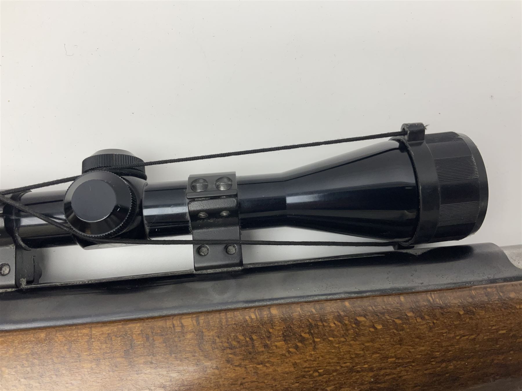 Weihrauch model HW 77 K  .22 air rifle with under lever action, beech stock with chequered pistol grip and Tasco WA39x40-1 scope, serial no.1283661 L102cm overall NB: AGE RESTRICTIONS APPLY TO THE PURCHASE OF THIS LOT