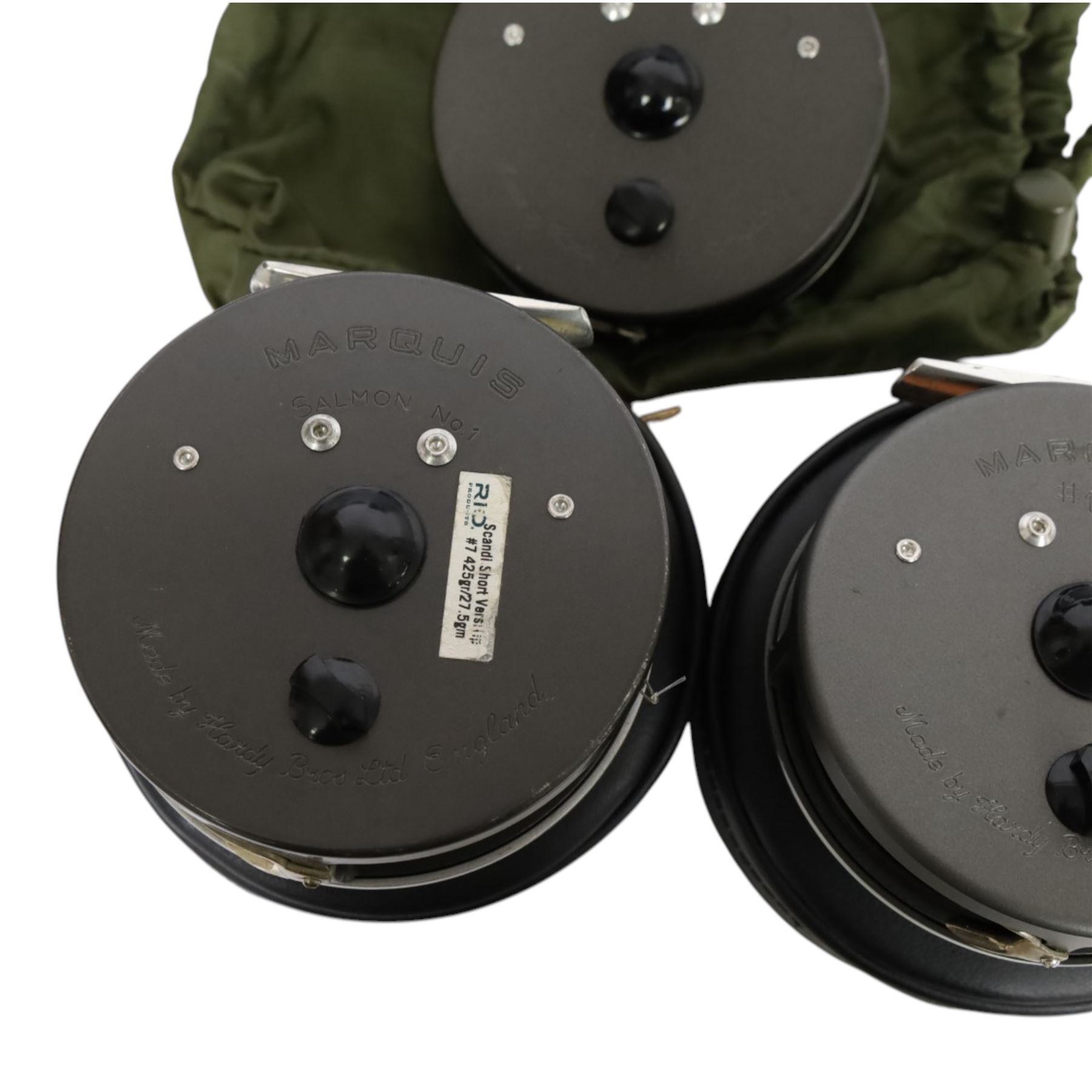 Three Hardy Bros Marquis fly fishing reels, comprising two No. 10 reels and a No.1 Salmon reel, two within black Hardy cases