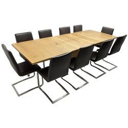 Contemporary walnut extending dining table, rectangular pull-out extending action top with two additional leaves, on rectangular base with burnished metal feet (160cm - 258cm x 100cm, H78cm); together with a set of ten cantilever dining chairs upholstered in stitched brown leather, on burnished metal supports 