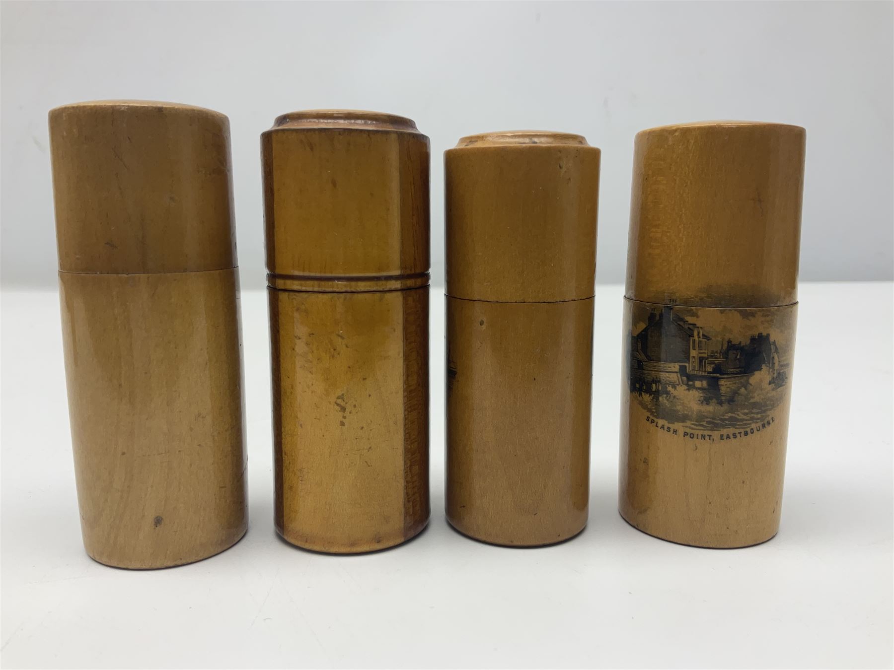 Collection of Mauchline ware relating to sewing, to include four ovoid shaped thimble cases, hinged lid thimble case and needle cases (12) 