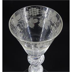 Mid 18th century wine glass, the funnel bowl engraved with fruiting vines upon a single series air twist double knopped stem and conical foot, H16.5cm
