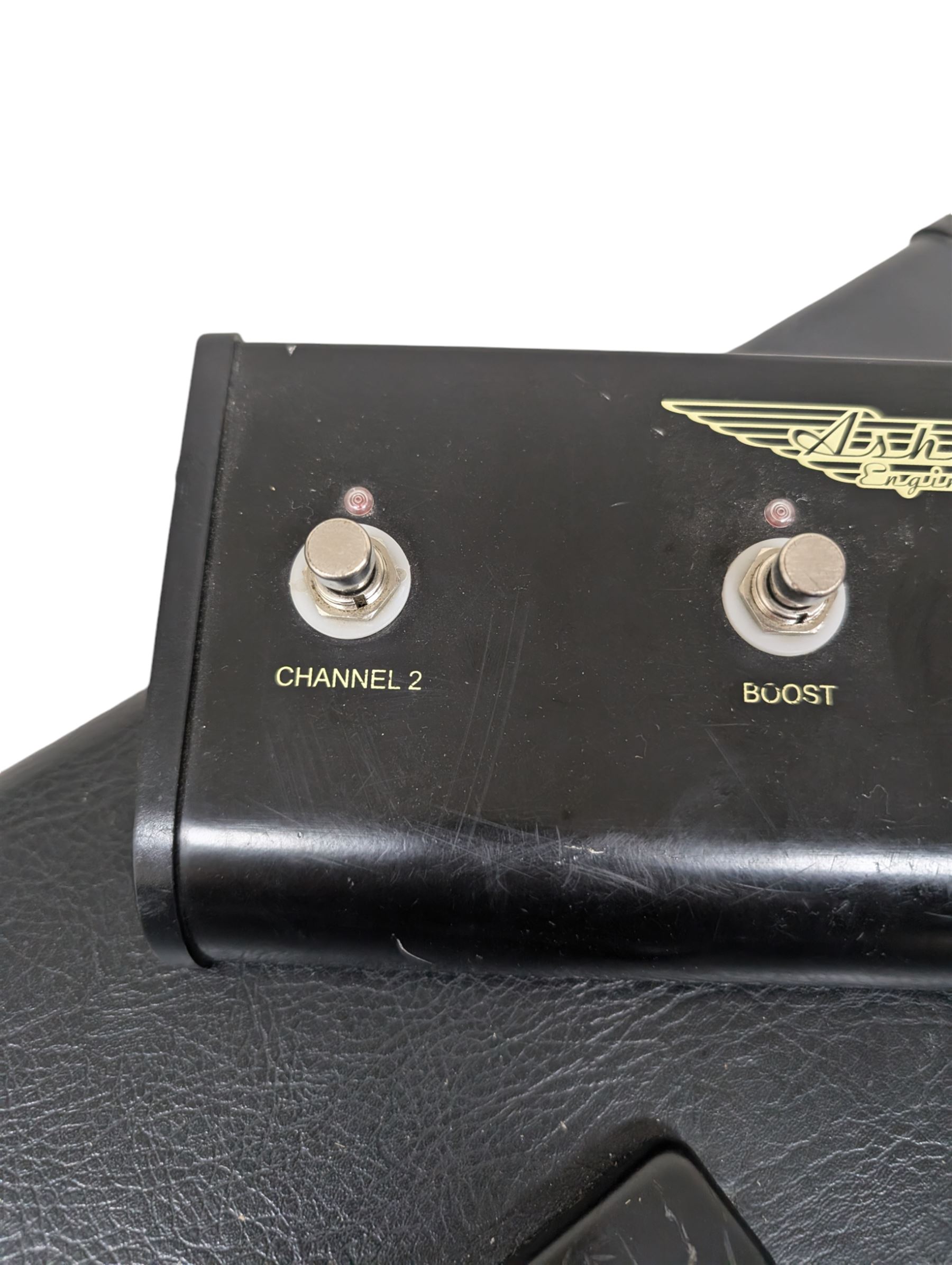 Ashdown Engineering Fallen Angel 60 DSP guitar amplifier head model no. FA60H, serial no. 18930406, 4 x 12 speaker cabinet, model no. FA 412A serial no. 20210106, and a four-button foot pedal, head H24cm, W70cm, cab H78cm, W70cm