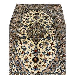 Small Persian Kashan rug, the field decorated with central medallion surrounded by stylised plant motifs, guarded border decorated with floral motifs and trailing leafy branch