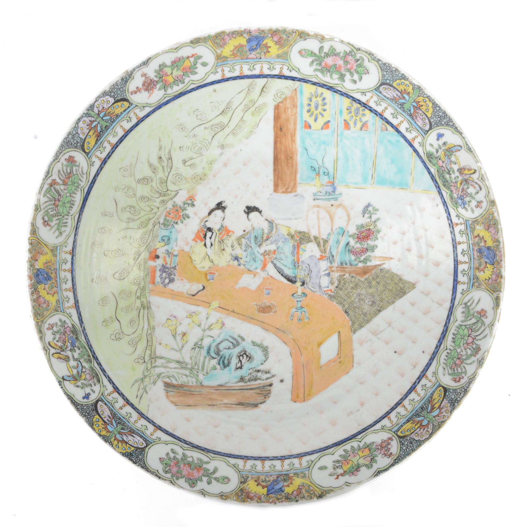 19th century Chinese Canton charger, decorated in polychrome enamels with figures to centre, bordered with panels of flowers and butterflies, D34cm