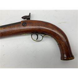 Re-manufactured percussion converted from flintlock single barrel pistol, the 20cm barrel with ramrod under, reused back action lock, brass furniture and hardwood stock L41cm overall