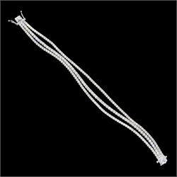 18ct white gold three row round brilliant cut diamond bracelet, stamped, total diamond weight approx 7.70 carat