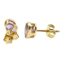 Pair of 9ct gold oval tanzanite stud earrings stamped 925