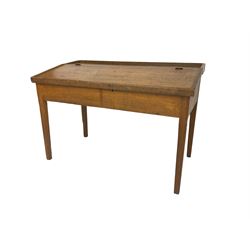 Late 19th century walnut school desk, sloped hinged lid, on square tapering supports 