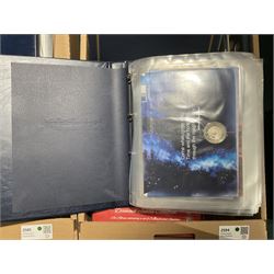 Approximately one hundred and fifteen Royal Mint coin covers, in two ring binder folders and loose, together with approximately 53 grams of Great British pre-1920 and approximately 68 grams of Great British pre-1947 silver threepence coins, and a small quantity of further pre-decimal coins
