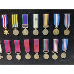Two limited edition large framed display boards with half-size copies of British Gallantry and Campaign Medals produced by Danbury Mint and entitled 'For Valour'. Sixty medals on each board, all with ribbons. Complete with Danbury Mint certificate serial number A0148 and other paperwork.