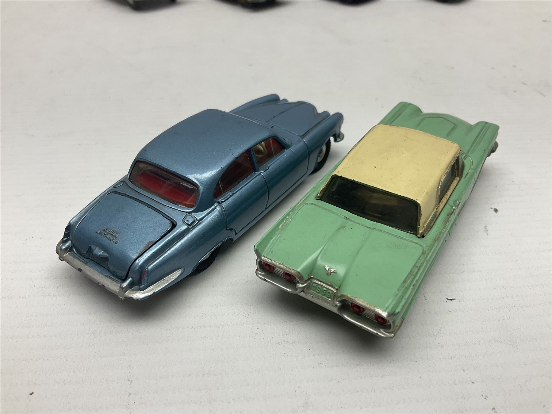 Eleven unboxed and playworn early die-cast models including Dinky Packard, Buick, two Jaguar Mark X and estate wagon, Corgi Mercedes-Benz 300S.L. Roadster, Ford Thunderbird, Citroen DS19 and Bentley Continental Sports Saloon, Spot-On Armstrong Siddeley Sapphire etc; all unboxed (11)
